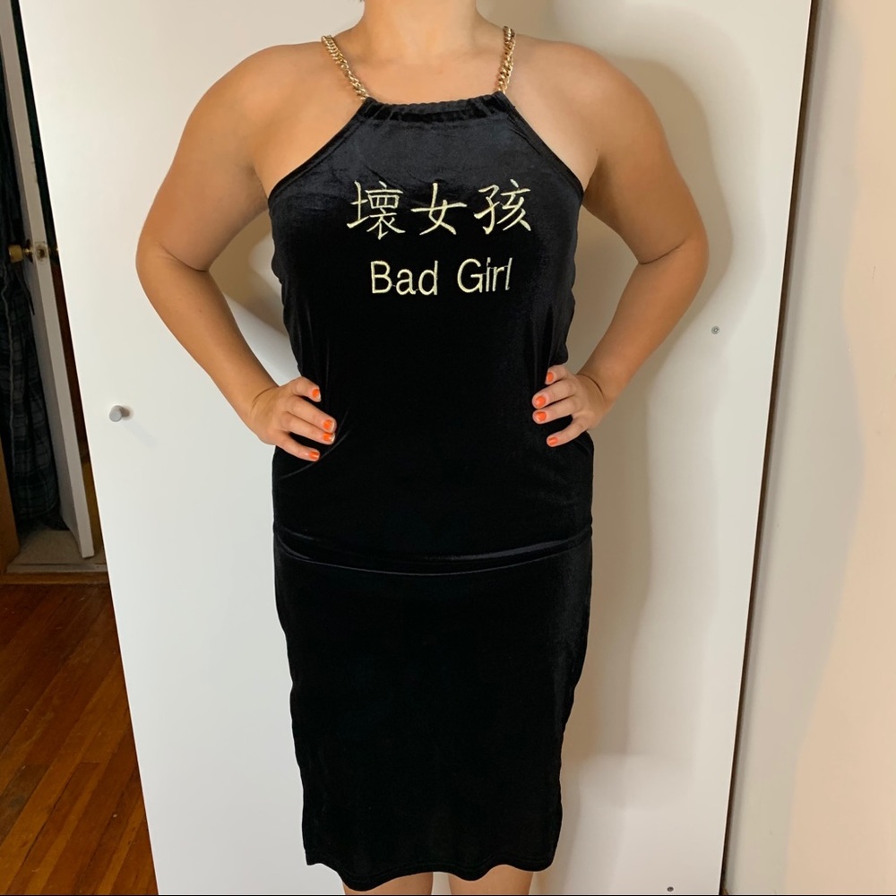 Black velvet slitted dress